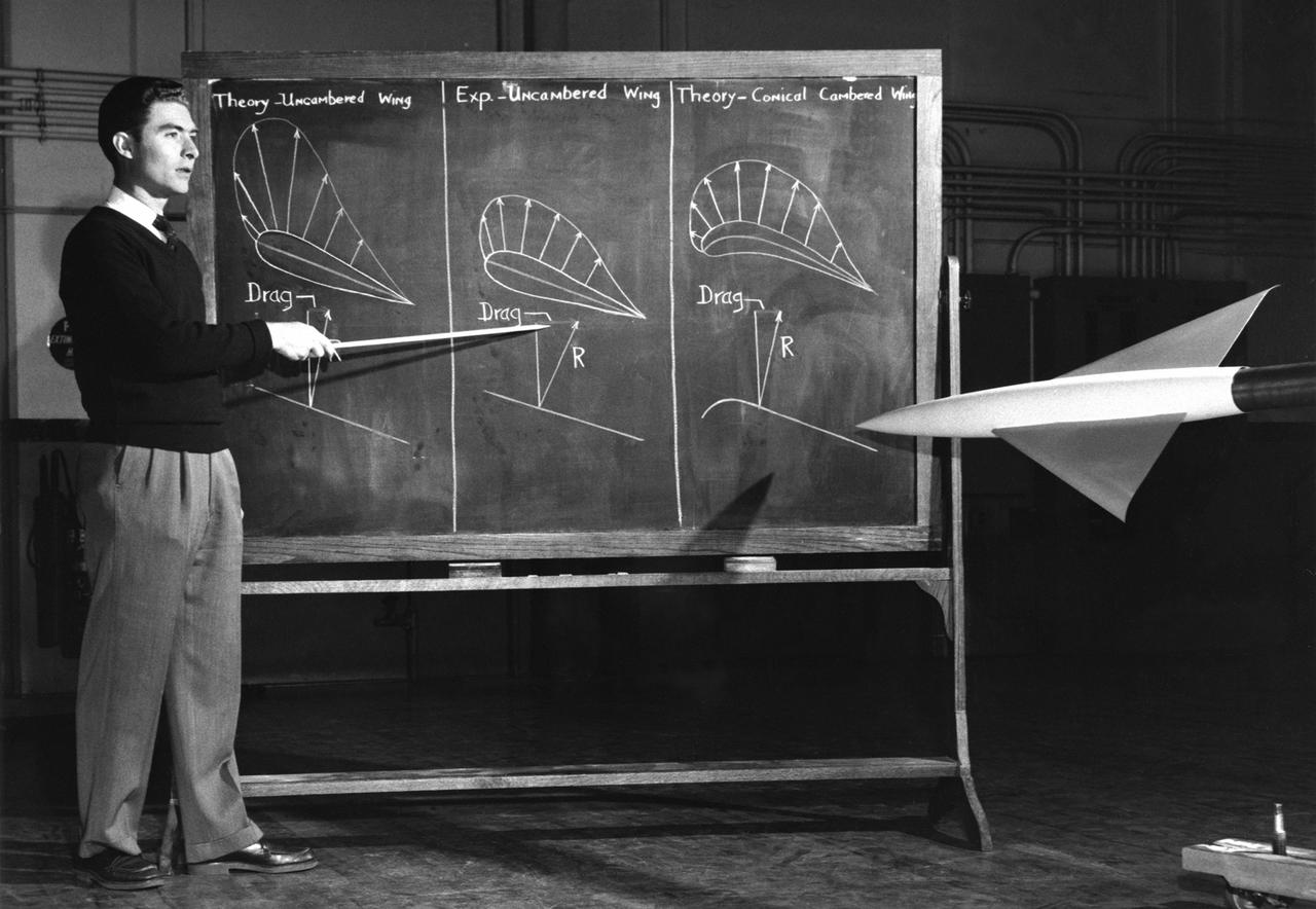 NACA Photographer John W. Boyd explaining the efficiencies of conical camber