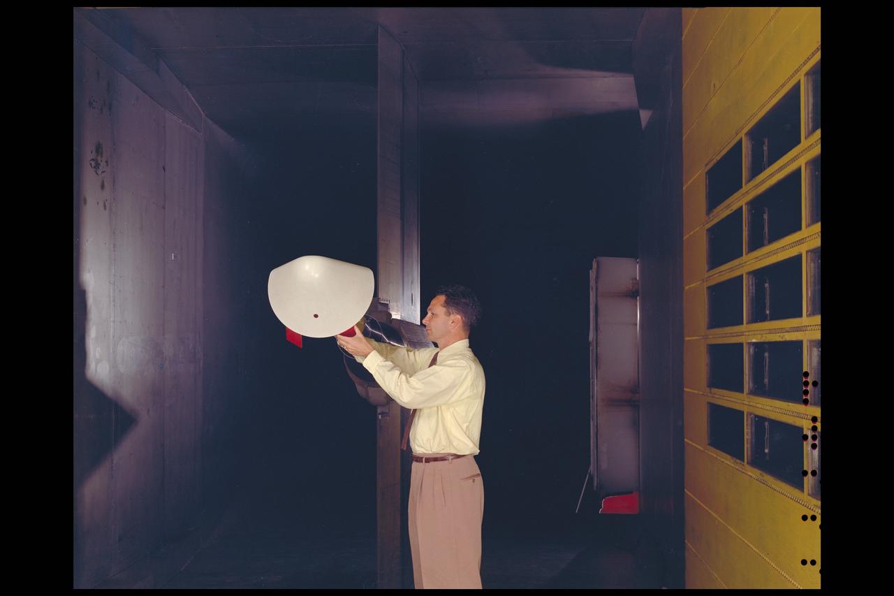 Project Mercury: M-1 model in the 11ft w.t. with engineer