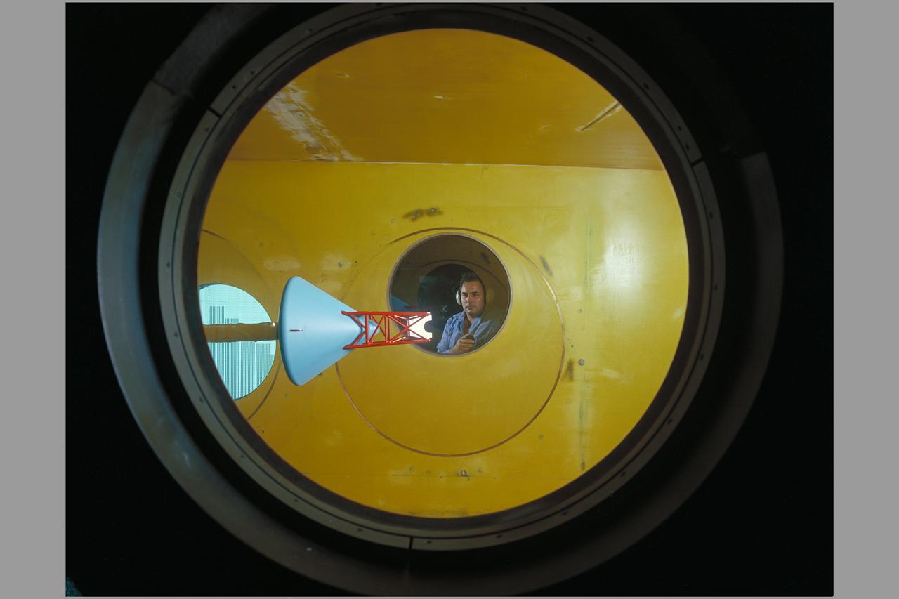 Side view of assembled command module, tower with flap & launch-escape rocket. Apollo FS-2 in 9 x 7 ft. SupersonicWind Tunnel.