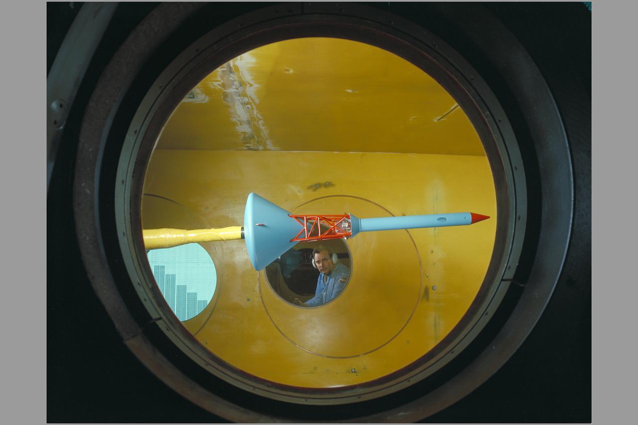 Side view of assembled command module, tower with flap & launch-escape rocket. Apollo FS-2 in 9 x 7 ft. SupersonicWind Tunnel.