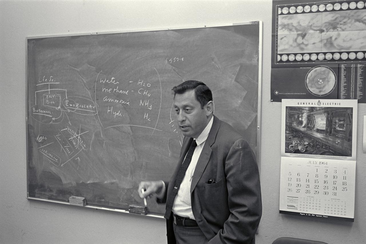 Dr Harold P. Klein at backboard