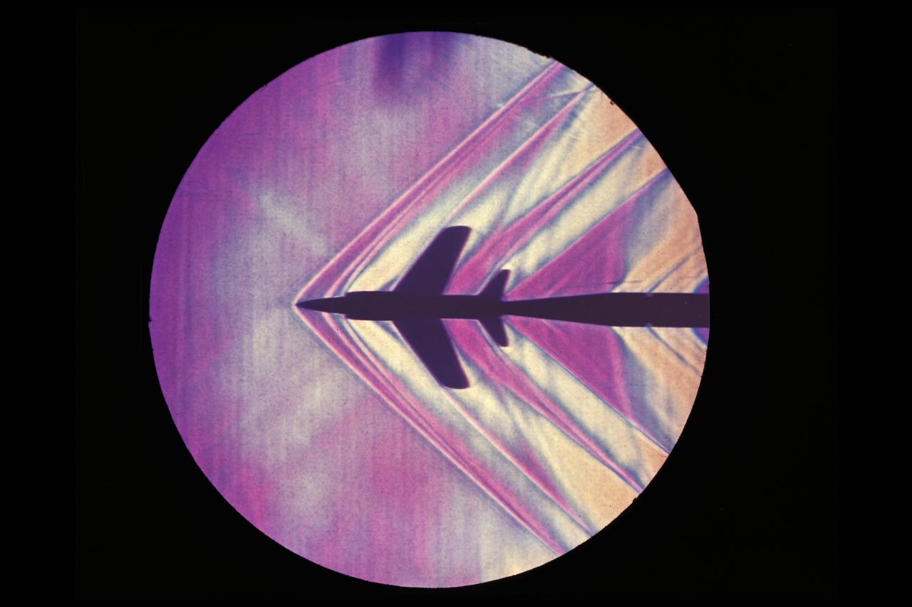 Schilieren of F11F-1 Tiger at Mach 1.4 in the 1x3ft. w.t.