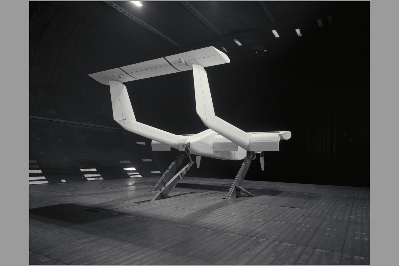 3/4 rear view of model with flaps down.  V/STOL Aircraft:  Wind tunnel investigation of rotating cylinder applied to training edge flaps for high lift & low-speed control.