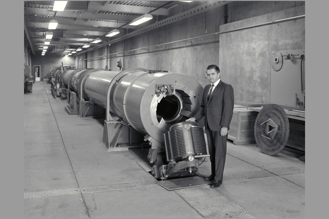 Thomas N. Canning, Hypersonic Free-Flight Branch Chief, inspects breech of the counter flow section of gun. Hypersonic Free-Flight Gun.