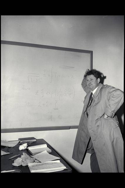 NASA image: Harvey Allen at the board.