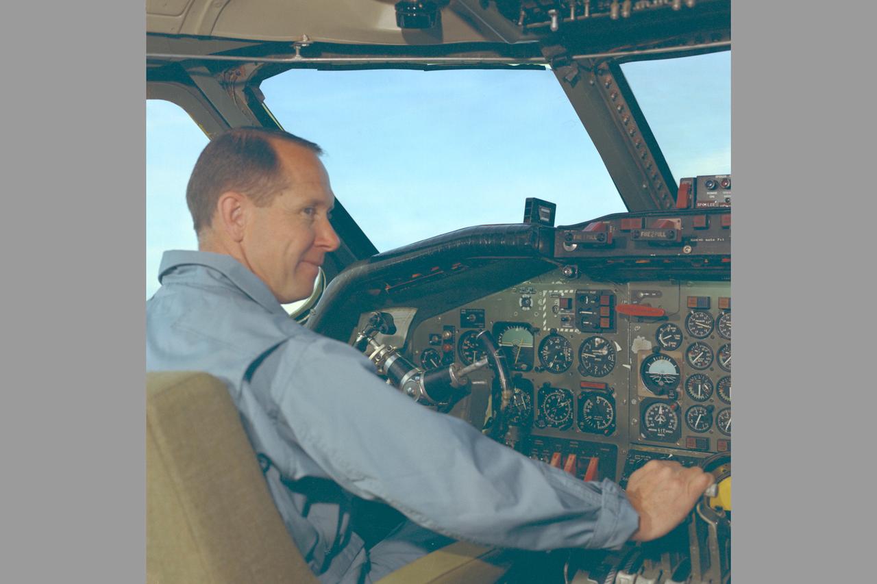 Pilot Fred Drinkwater in cockpit of CV-990