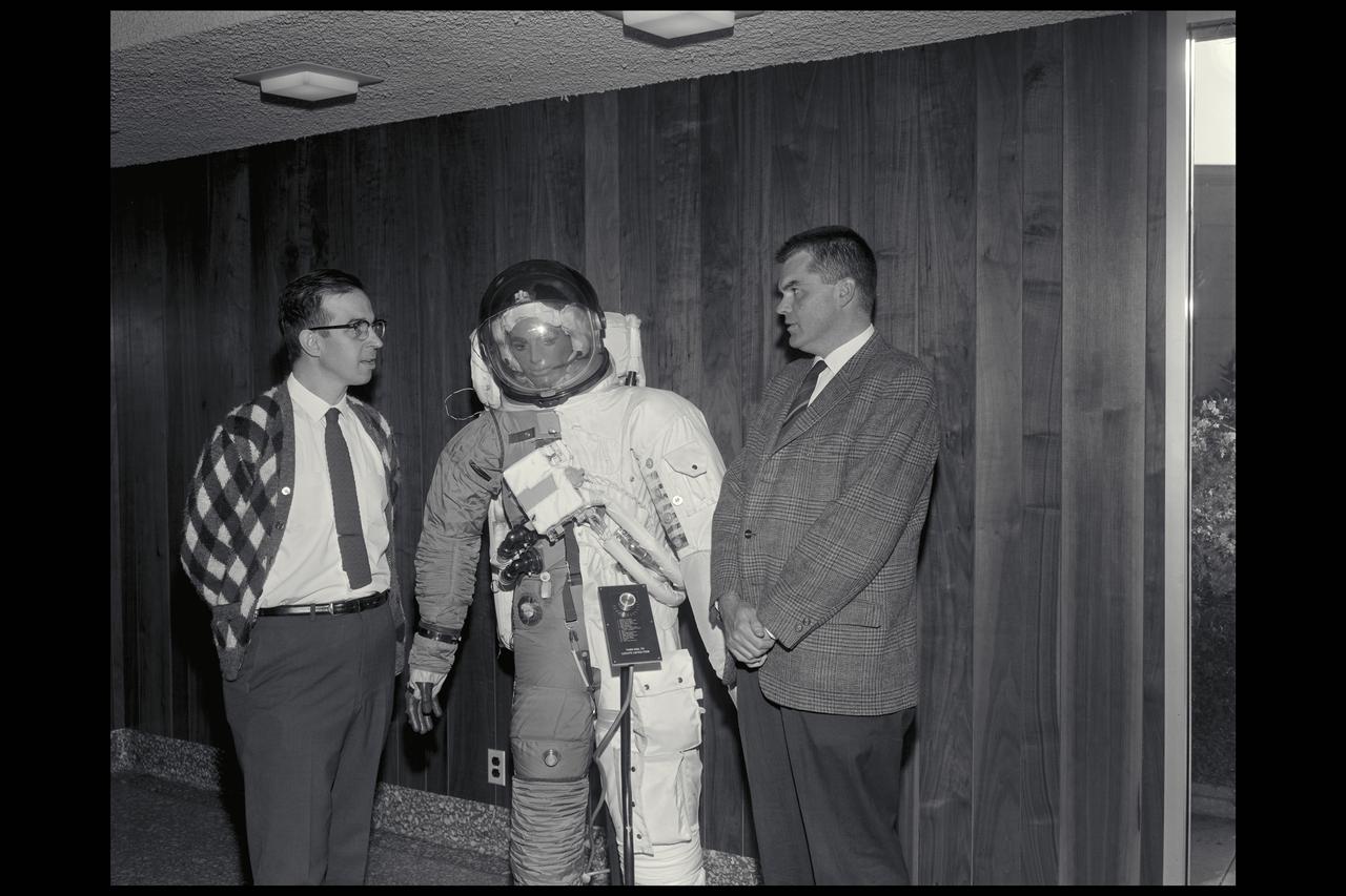 Dane Cone, Los Altos High School with Dr Hans Mark attending the Lunar Sample Exhibit  (space suit exhibit)