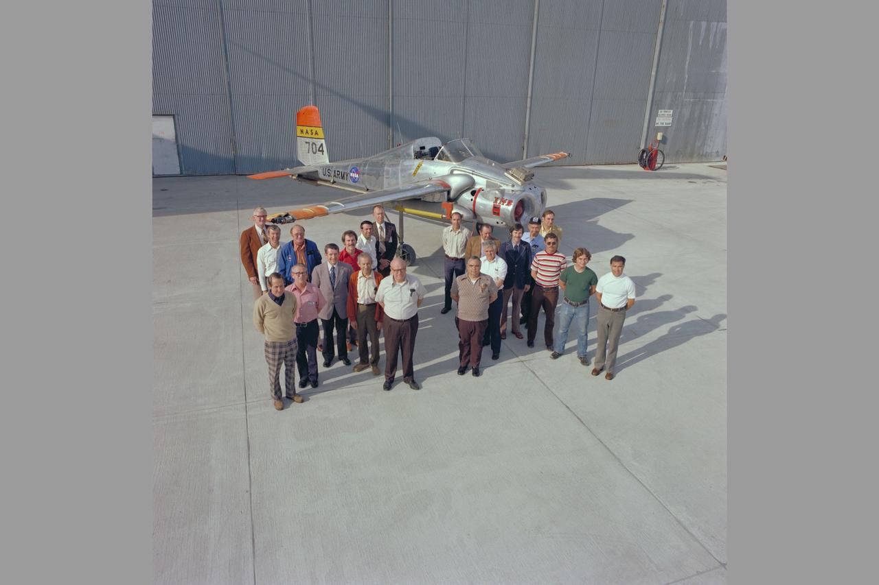 Olczak Bell X-14 AIRCRAFT TWENTIETH ANNIVERSARY.  Research Team:  Front Row: Fred Drinkwater, Jim Meeks, Lonnie Phillips, Jim Kozalski, Vic Bravo. Second Row: Bill Carpenter, Sid Selan, Dick Gallant, Terry Stoeffler. Third row: Ron Gerdes, Lloyd Corliss. Fourth row: Cy Sewell, Dick Greif, Ed Vernon, Lee Jones. Fifth Row: Dan Dugan, Jim Rogers, Dave Walton, Terry Feistel. Back Row: Frank Pauli, Seth Anderson. Not pictured: Terry Gossett, Bob Innis, Stew Rolls, Lawson Williamson. Note:  Used in publication in Flight Research at Ames;  57 Years of Development and Validation of Aeronautical Technology NASA SP-1998-3300 fig. 118