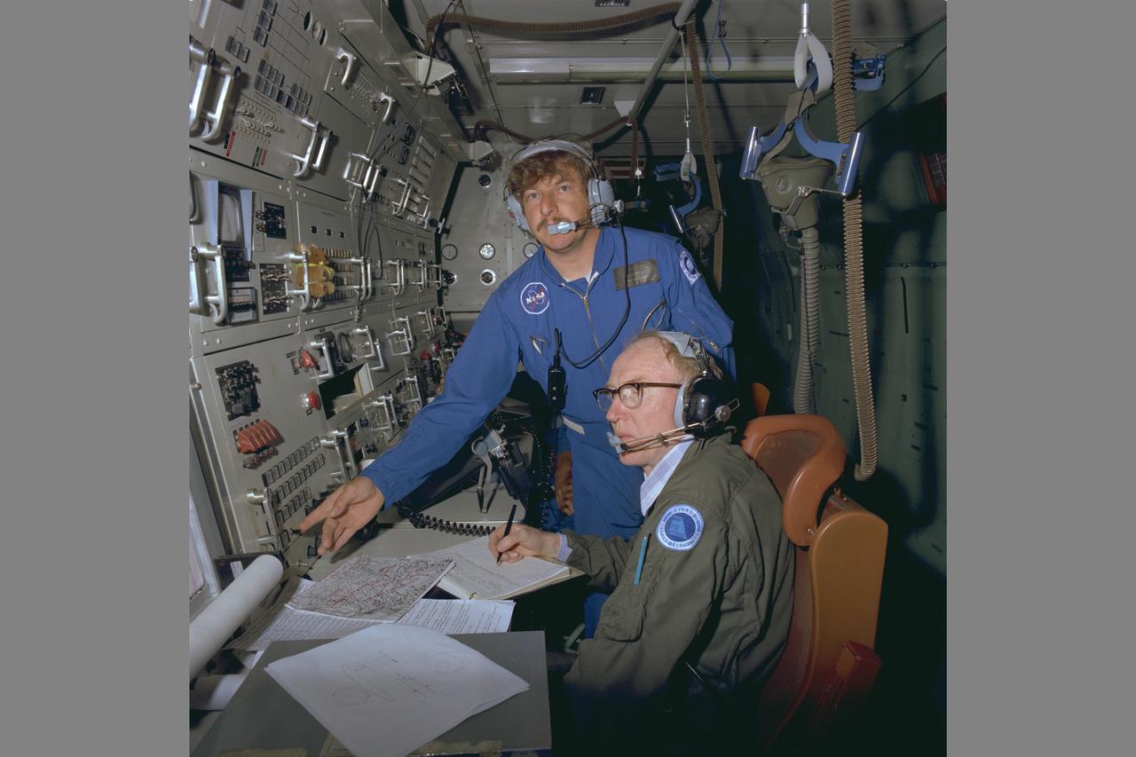 C-141 Kuiper Airborne Observatory (KAO) cabin interior with experimenters Dr. L Haughney and investigator