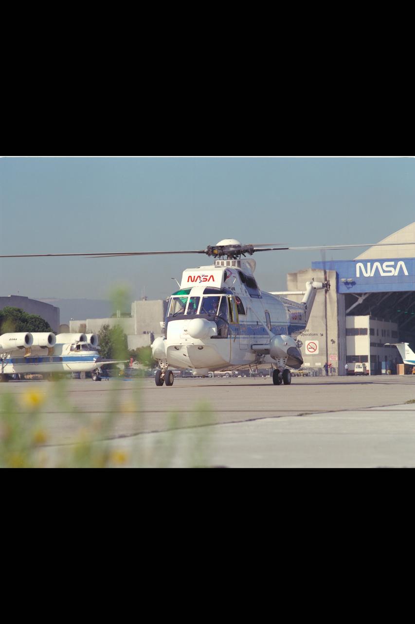 SH-3G (NASA-735) Helicopter on roll out from Ames ramp