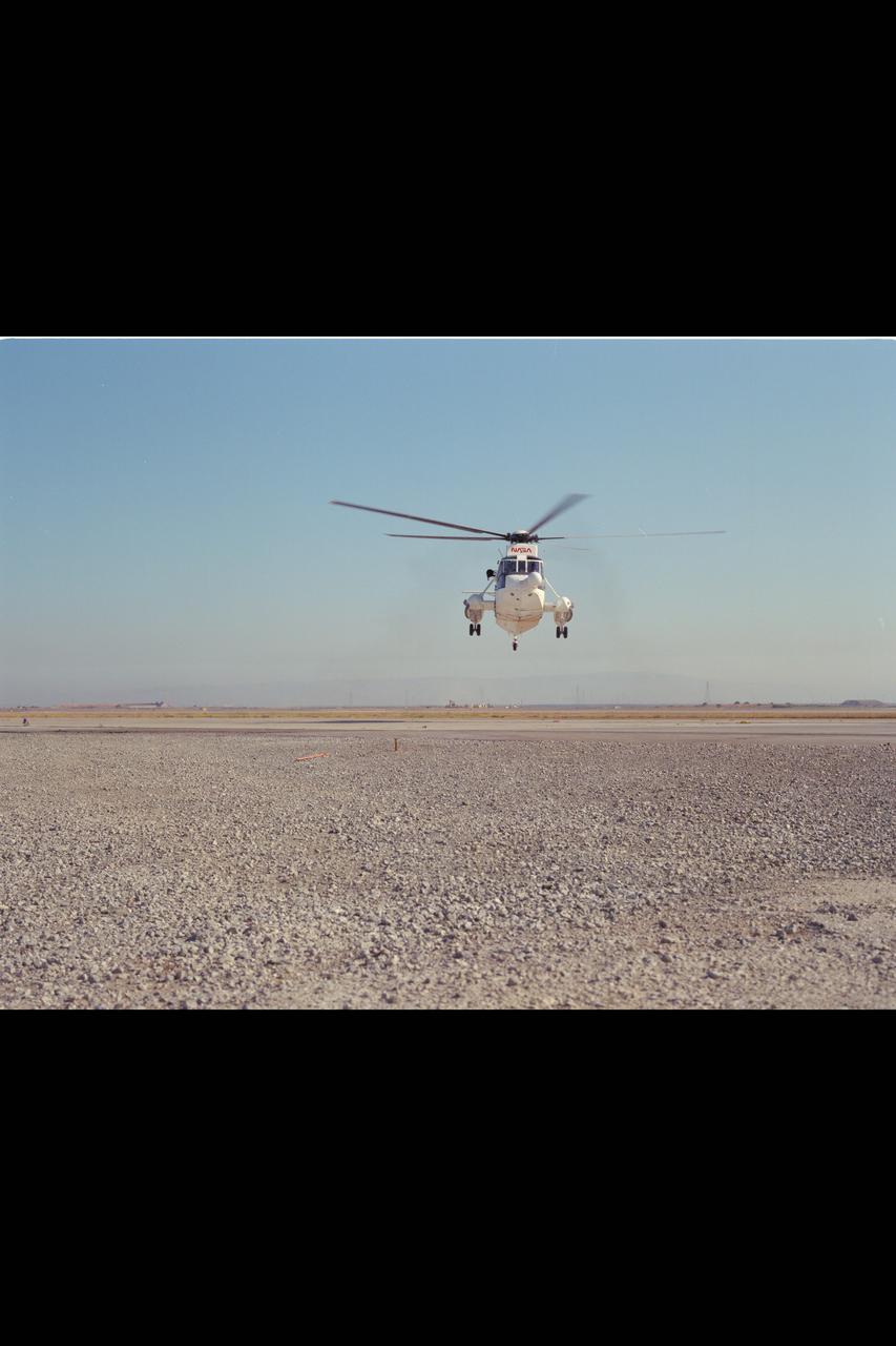 SH-3G (NASA-735) Helicopter in flight.
