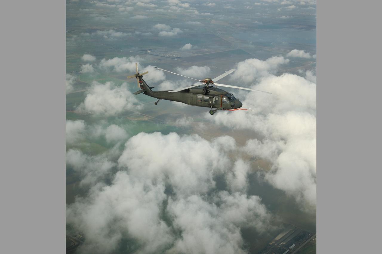 Uh-60B (NASA-748) Blackhawk with Mux Bucket in flight