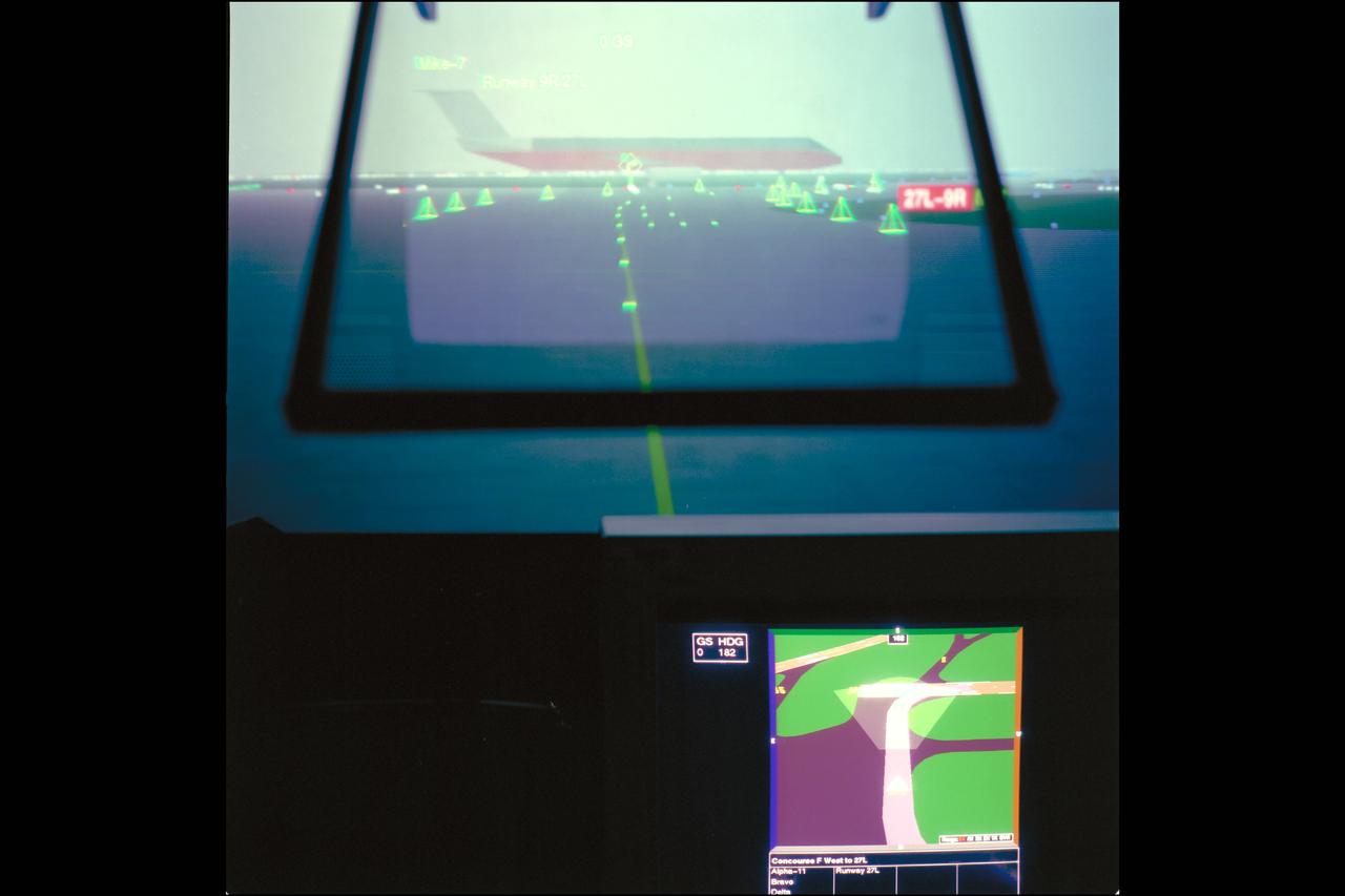 LVLASO (Low Visability Landing and Surface Operations) Project. Taxiway Navigation and Situtation Awareness (TNAS) system will help pilots taxi safely, particularly in low visibility weather conditions using a combination of cockpit displays and the GPS satellite positioning system. HUD SIMULATION DISPLAYS (FOG IN HEADS-UP DISPLAY).