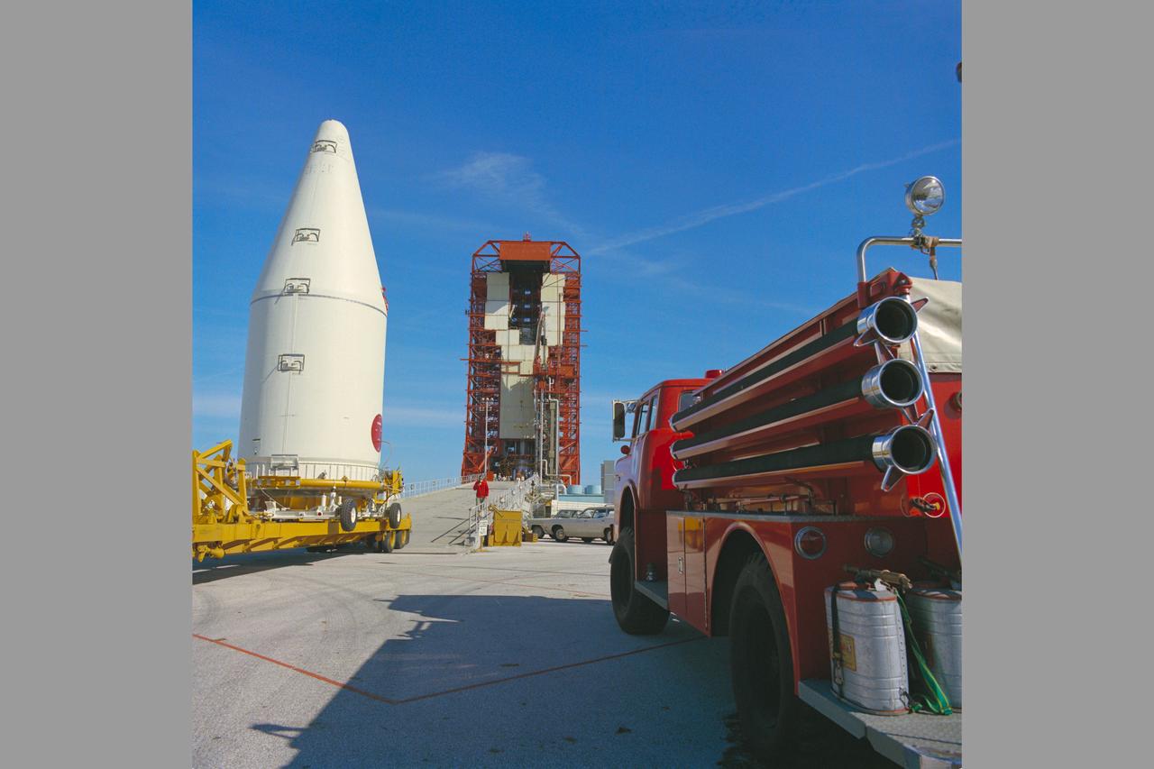 Pioneer-10 (or F) spacecraft encapsulated and moving to pad at Cape Kennedy for matting with a Atlas-Centaura launch vehicle in preparation for mission to Jupiter