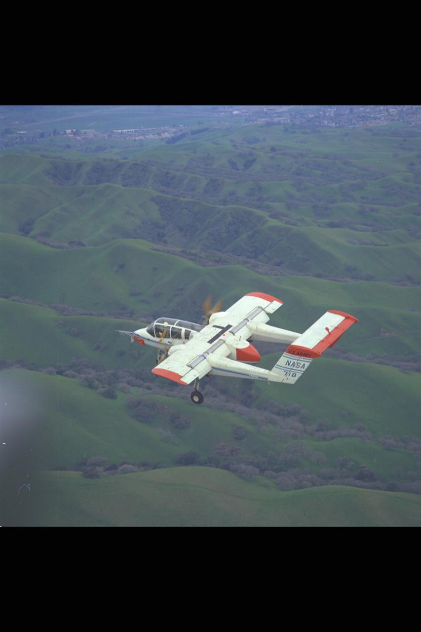 OV-10A (NASA-718) Airplane in flight. (Air to Air)