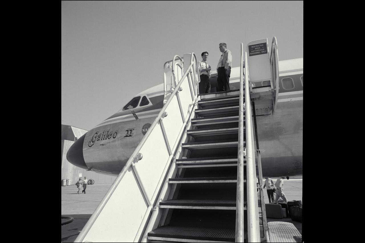 CV-990 Galileo II arrival at Ames after first expedition -  decending ramp are from top Don Anderson, Mike Bader,  Hans Mark