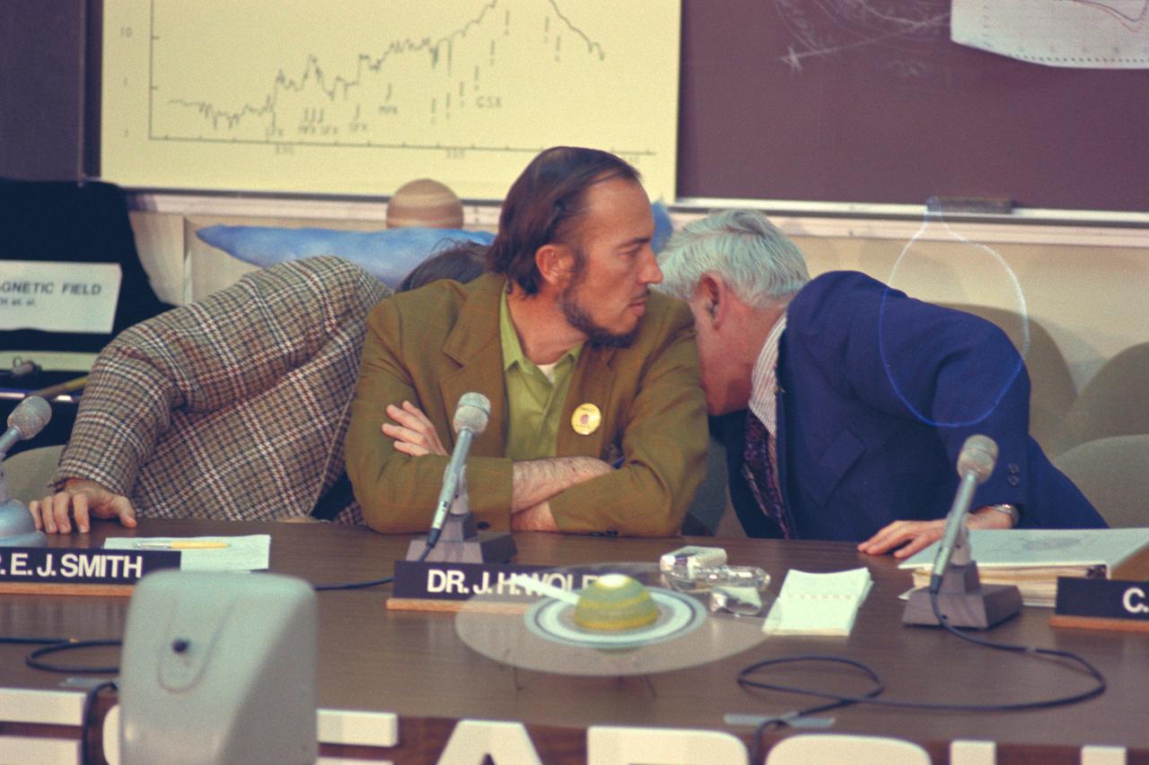 Dr E. J.Smith, John Wolf (Ames) and Charles Hall (Ames) confer  during press conference for Pioneer 11 Jupiter encounter