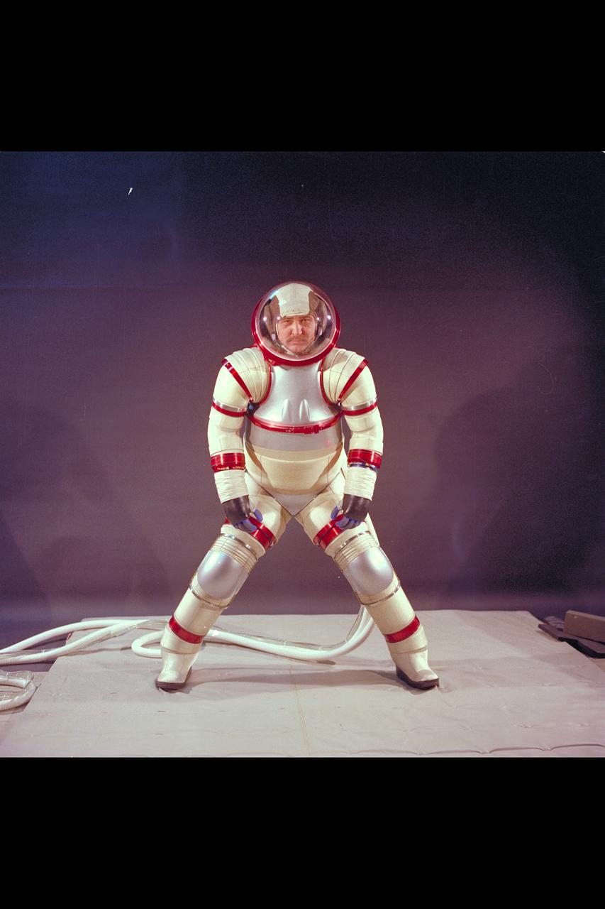 Hubert Vykukal demonstrates mobility of the Hardsuit AX-3 Space Suit design