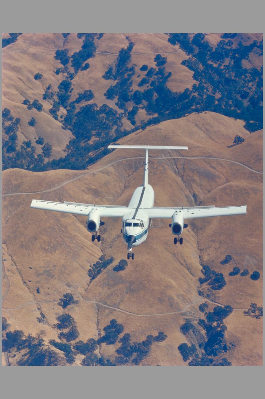 Air to air of the C-8A (NASA 716).  Air to air of the C-8A (NASA 716)