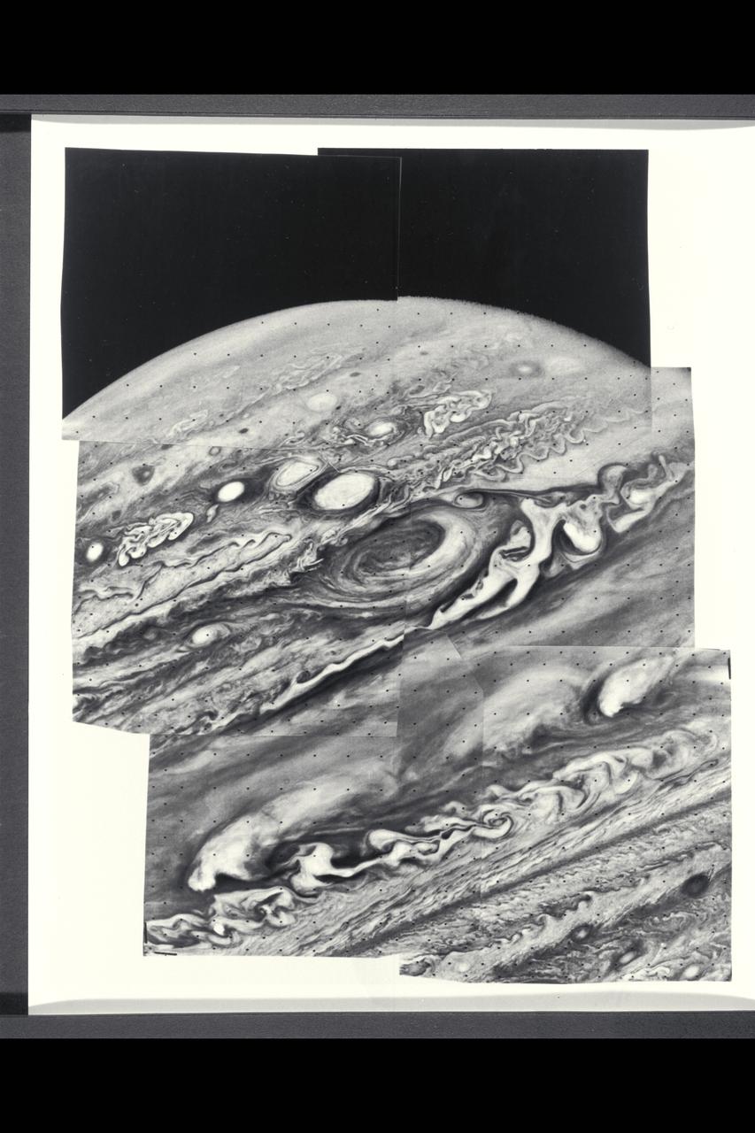 Range : 6.5 million kilometers (4 million miles) Six violet images of Jupiter makes the mosaic photo, showing the Great Red Spot as a swirling vortex type motion.  This motion is also seen in several nearby white clouds.  These bright white clouds and the Red Spot are rotating in a counter clockwise direction, except the peculiar filimentary cloud to the right of the Red Spot is going clockwise.   The top of the picture shows the turbulence from the equatorial jet and more northerly atmospheric currents.  The smallest clouds shown are only 70 miles (120 km) across.