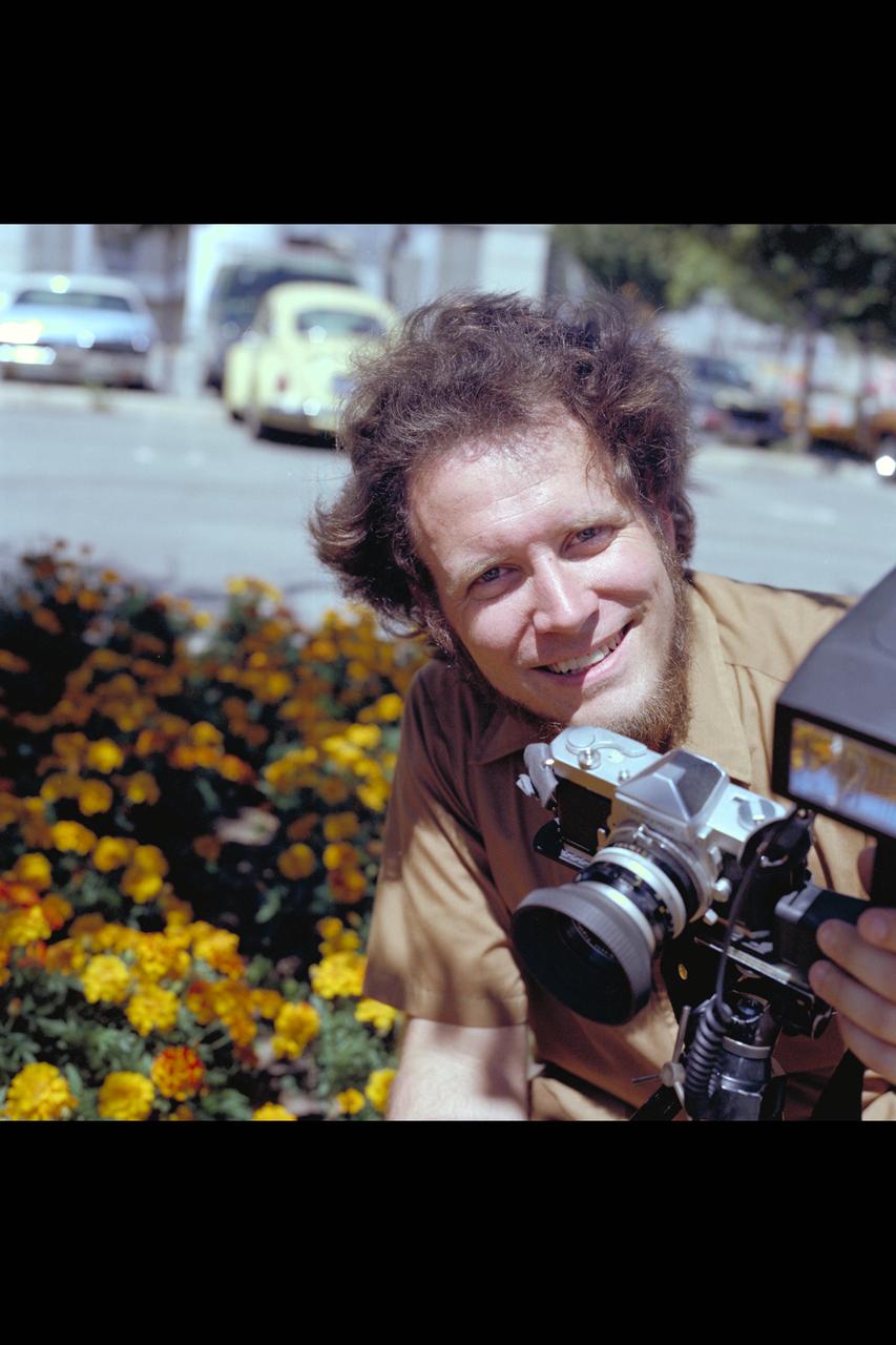 Recruiting Brochure: Ames employee and amateur photographer John Wallace uses base flower gardens as subject of his interest.