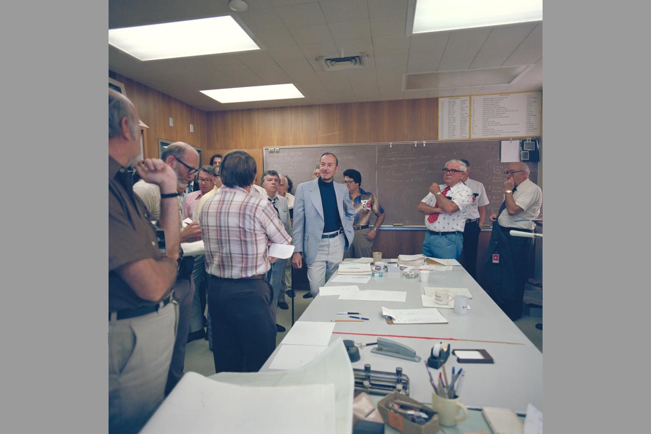 Pioneer Saturn: Charlie Hall, project manager daily stand up meeting shown are John Wolfe, Charlie Hall, Sy Syvertson and Richard Fimmel in bkgrd