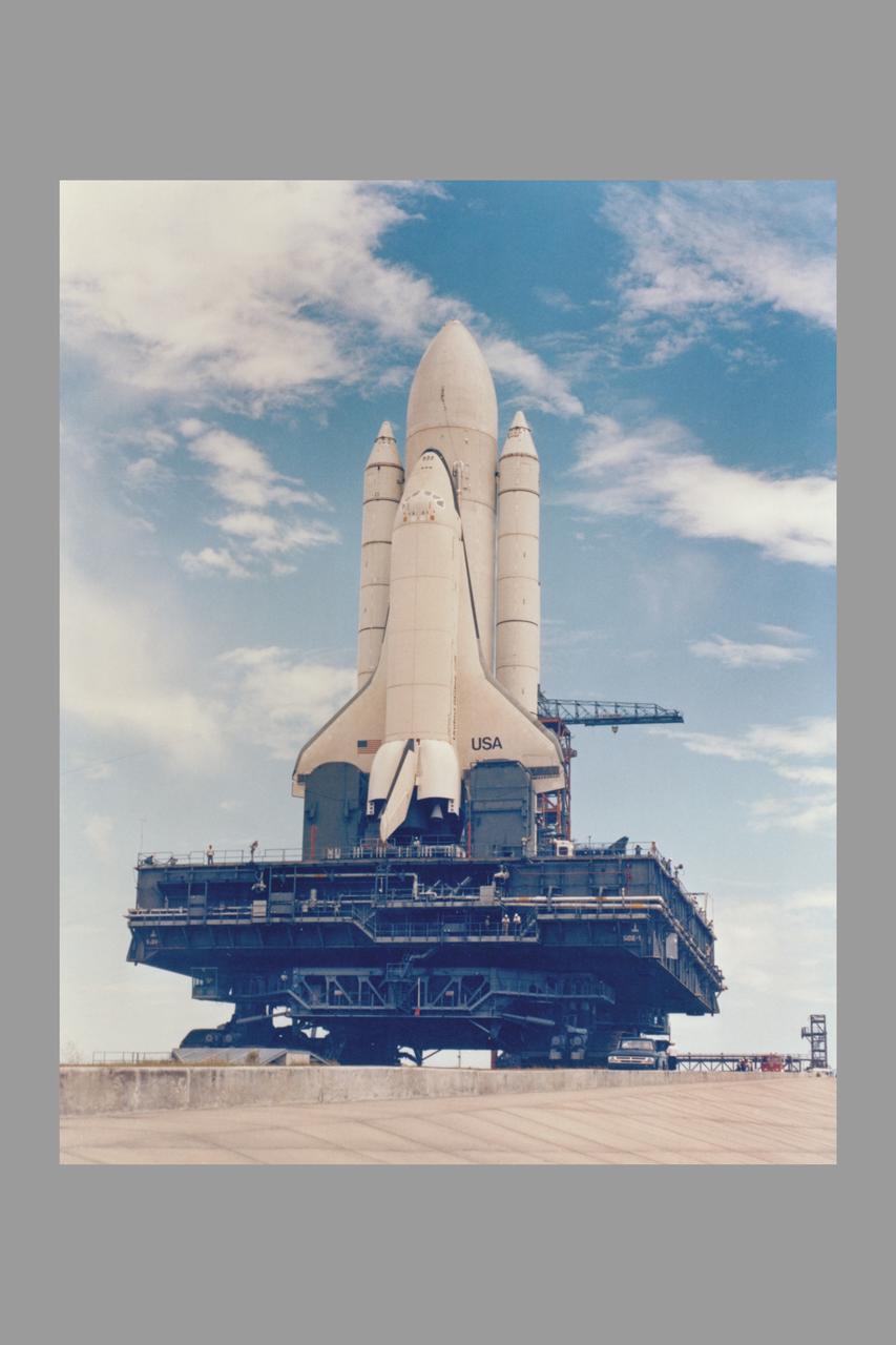 Space Shuttle Orbiter Enterprise mated to an external fuel tank and two solid rocket boosters on top of a Mobil Launcher Platform, undergoes fit and function checks at the launch site for the first Space Shuttle at Launch Complex 39's Pad A.  The dummy Space Shuttle was assembled in the Vehicle Assembly Building and rolled out to the launch site on May 1 as part of an exercise to make certain shuttle elements are compatible with the Spaceport's assembly and launch facilities and ground support equipment, and help clear the way for the launch of the Space Shuttle Orbiter Columbia.