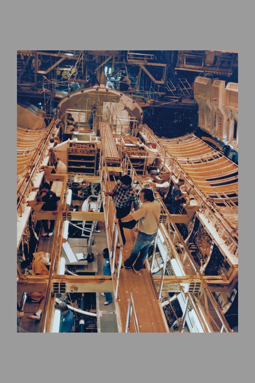 The payload bay doors of the Space Shuttle Orbiter Columbia were opened for the first time today using the orbiter's onboard door operation system. The hinges of the payload bay doors are not designed to support the weight of the doors while open horizontally in the Earth's one 'g' environment and a counterweight zero 'g' device supports the weight of the doors while they are open for processing in the OPF.