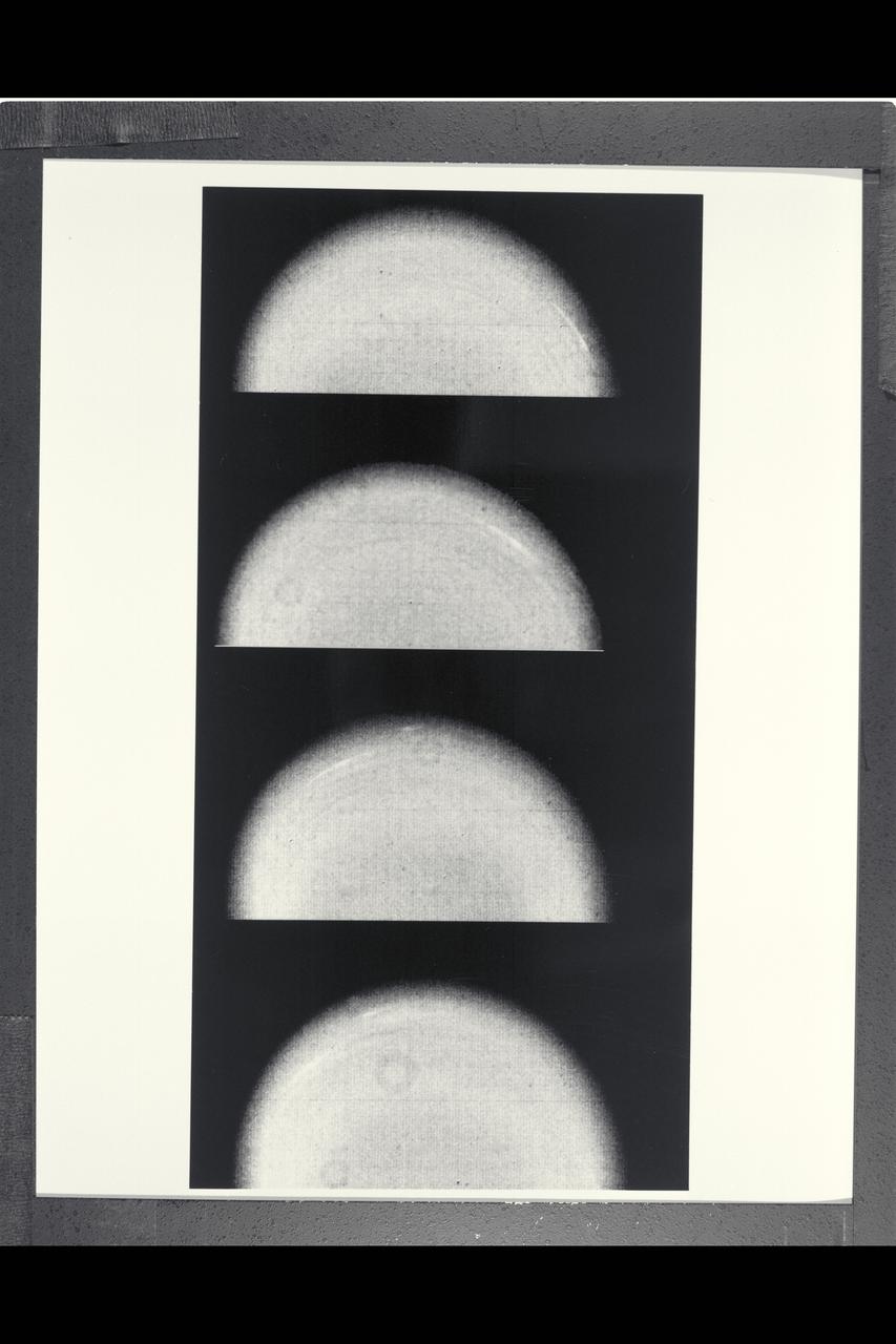 Range : 12.9 million km. ( 8.0 million miles ) P-29467B/W Time lapse Voyager 2 images of Uranus show the movement of two small, bright, streaky clouds, the first such features ever seen on the planet. The clouds were detected in this series of orange filtered images, over a 4.6 hour interval ( from top to bottom ). Uranus, which is tipped on its side with respect to the other planets, is rotating in a counter-clockwise direction, with its pole of rotation near the center of the disk, as are the two clouds seen here as bright streaks. The larger of the two clouds is ata lattitude of 33 degrees. The smaller cloud, seen faintly in the three lower images, lies at 26 degrees ( a lower alttitude and hence closer to the limb). Their counterclockwise periods of rotation are 16.2 and 16.9 hours, respectively. This difference implies that the lower lattitude feature is lagging behind the higher latitude feture at a speed of almost 100 meters pers second (220 mph). Latitudinal bands are also visible in these images, the faint bands, more numerous now then in previous Voyager images from longer range, are concentric with the pole rotation. thatis, they circle the planet in lines of contant latitude.