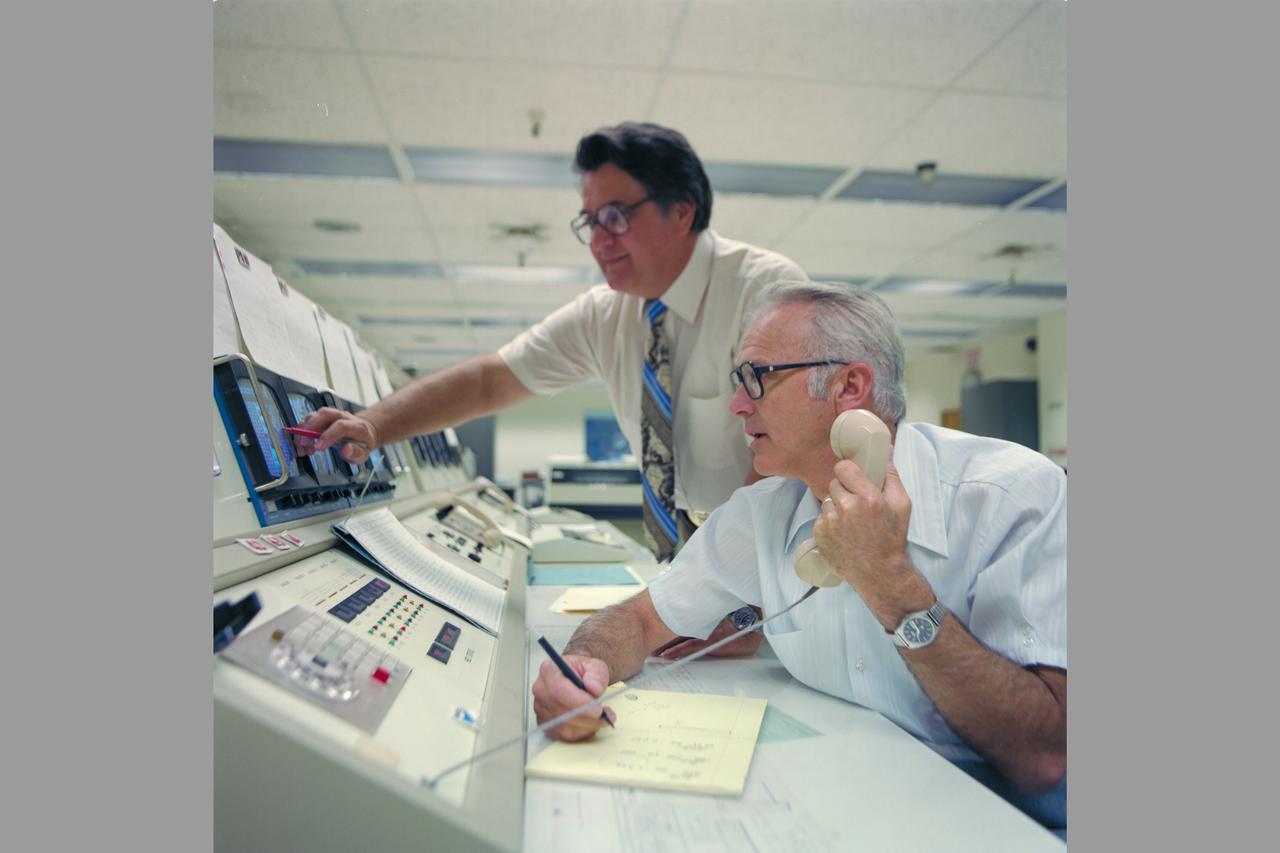 Pioneer Mission Control Center with personnel monitoring spacecraft (PMOC) includes Dr Richard Fimmel