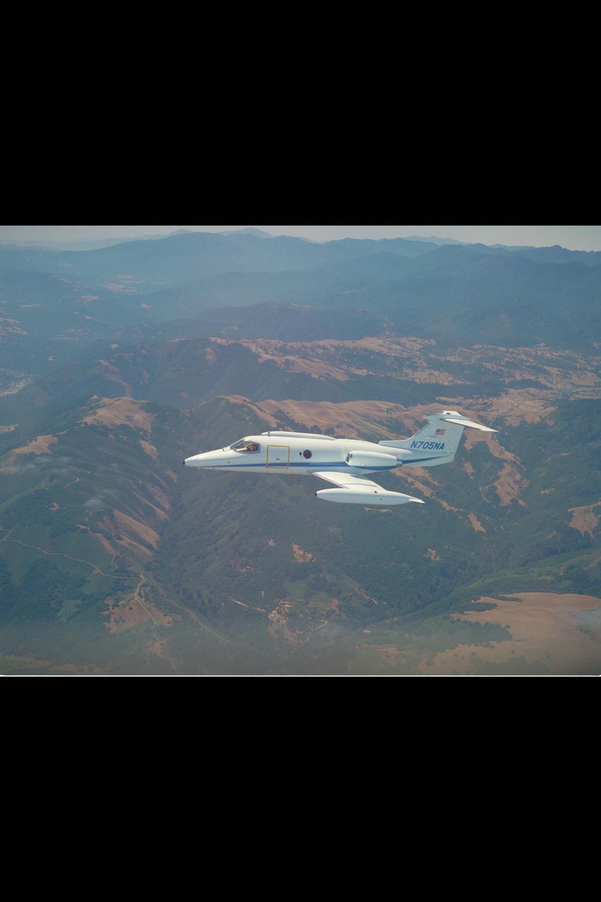 Lear Jet (NASA 705) in flight over Central CA.