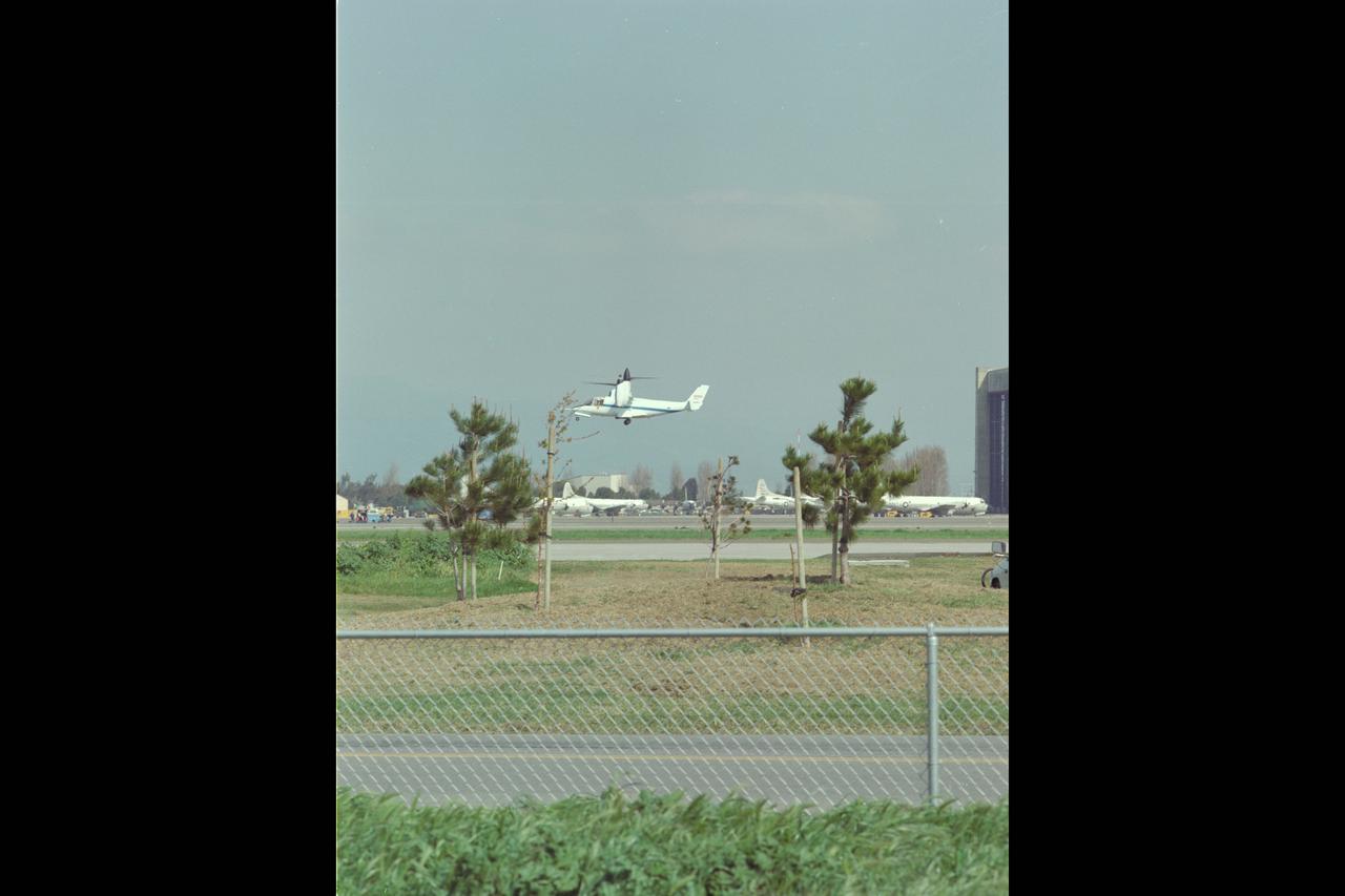 XV-15 (NASA-703) Evaluation Flight @ Ames; Above Title and Helicopter Mode from East Side Runway