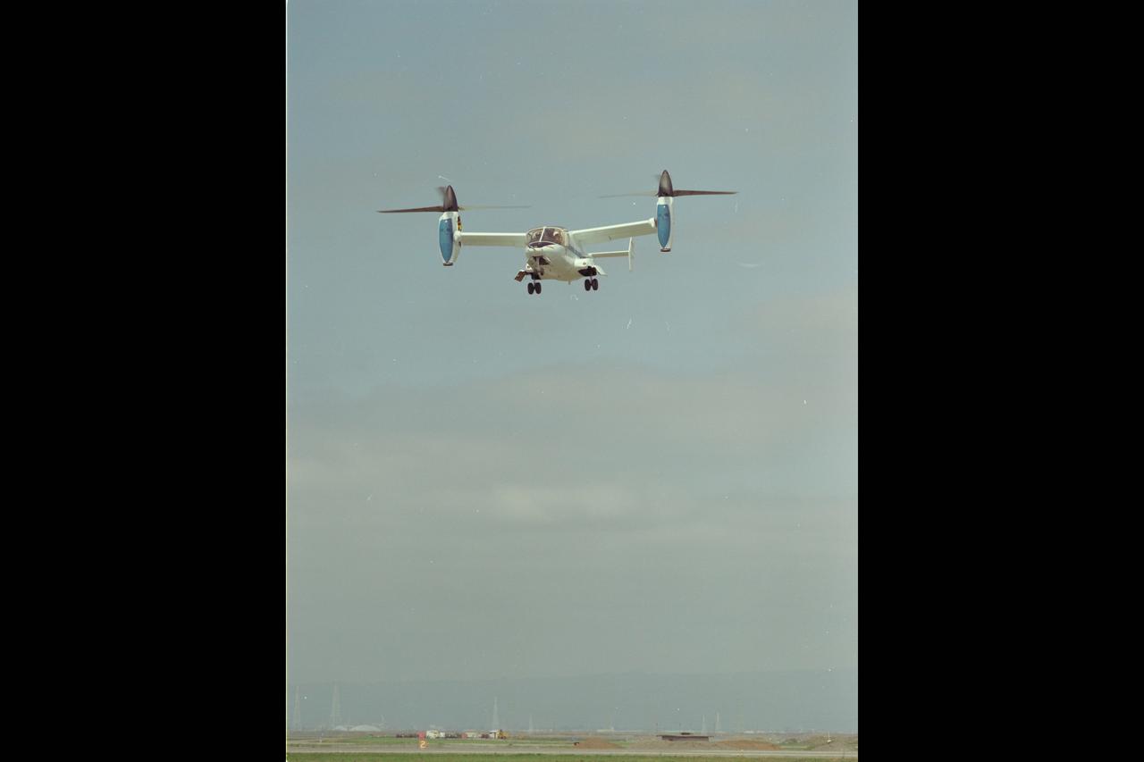 XV-15 Tilt Rotor (NASA-703) hovers at Ames Research Center