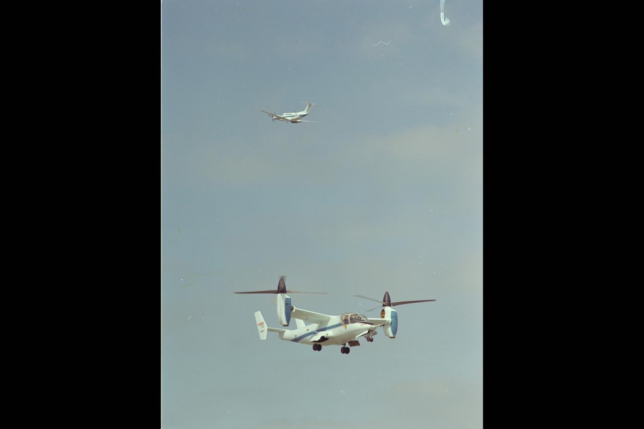 XV-15 Tilt Rotor (NASA-703) hovers at Ames Research Center