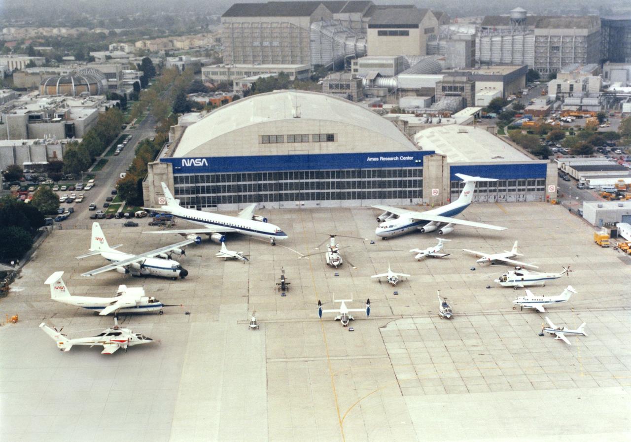 Ames Aircraft complement on ramp  DC-8, C-130, QSRA, RSRA, C-141, U-2, SH-3G, King Air, YO-3A, T-38, CH-47, Lear Jet, AH-1G, AV-8B Harrier, OH-58A, XV-15, UH-1H