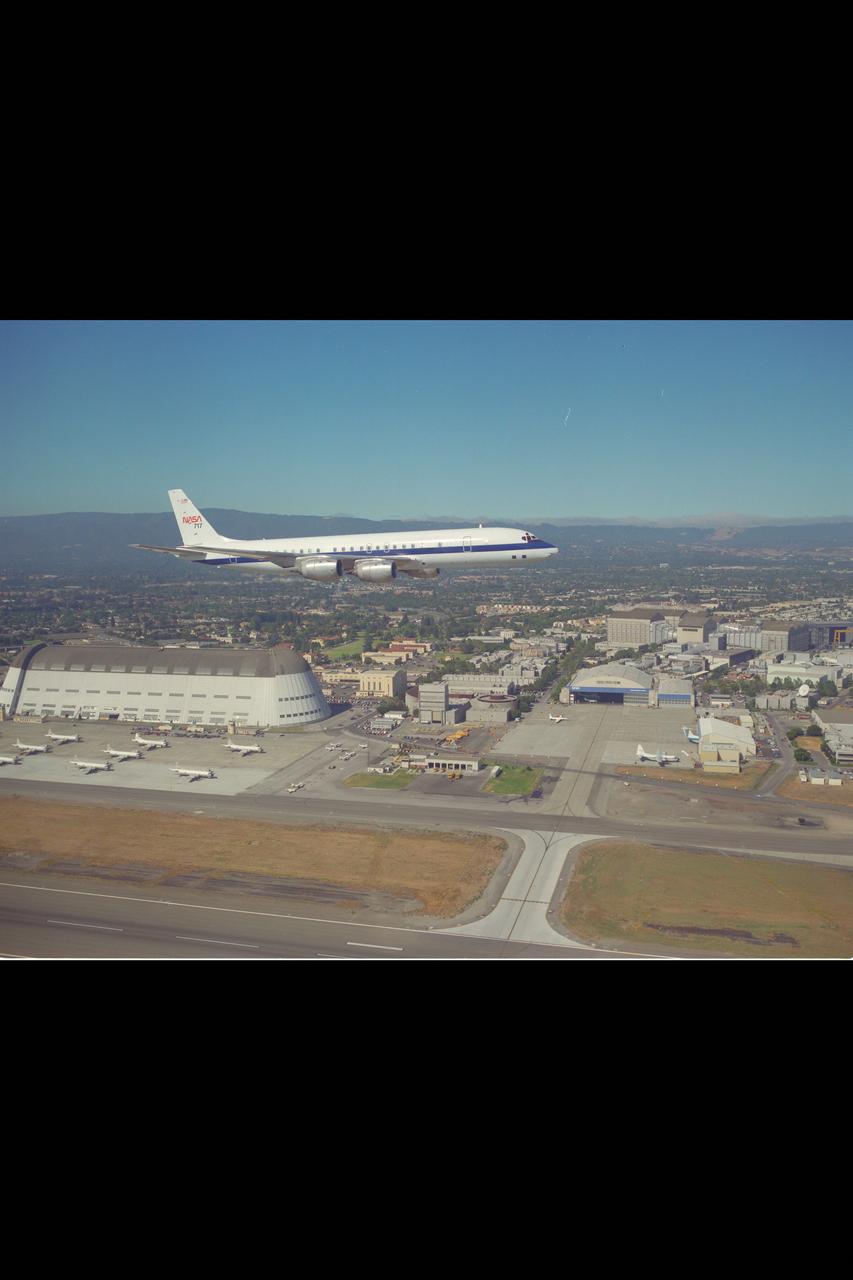 Newly arrived DC-8 (NASA-717) in flight over Ames