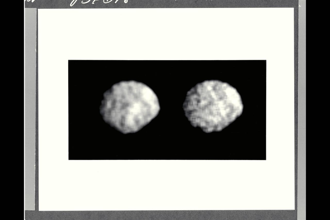 P-34698 These Voyager 2 images of satellite 1989N2 at a resolution of 4.2 kilometers (2.6 miles) per pixel reveals it to be an irregularly shaped, dark object. The satellite appears to have several craters 30 to 50 kilometers (18.5 to 31 miles) across. The irregular outline suggests that this moon has remained cold and rigid throughout much of its history. It is about 210 by 190 kilometers (130 by 118 miles), about half the size of 1989N1. It has a low albedo surface reflecting about 5 percent of the incident light.