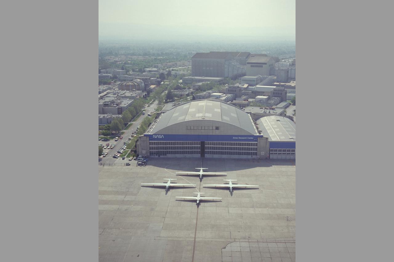 High Altitude MTPE Aircraft on flight line in front of N-211 hangar - three ER-2 and retiring U-2
