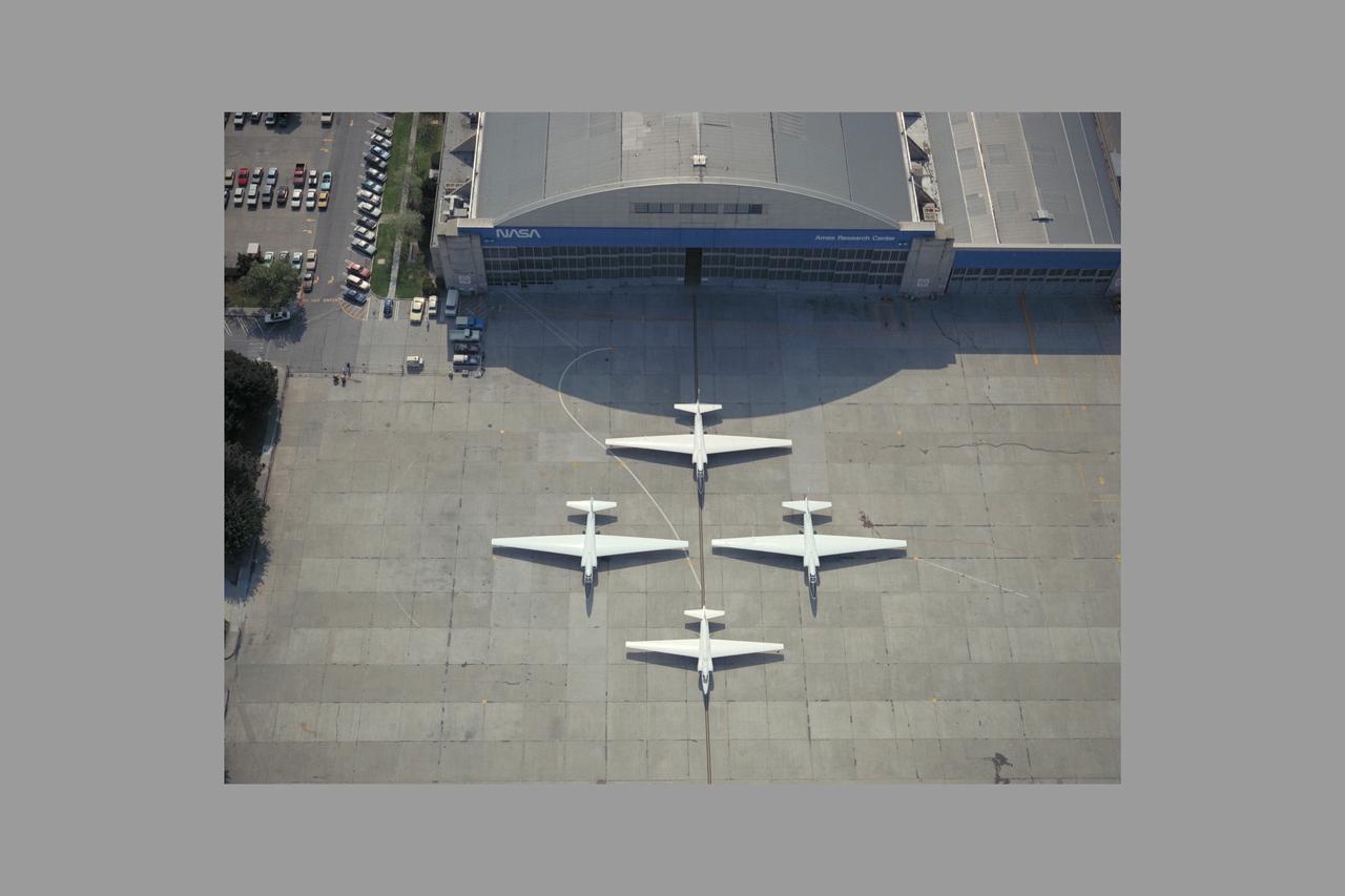 High Altitude MTPE Aircraft on flight line in front of N-211 hangar - three ER-2 and retiring U-2