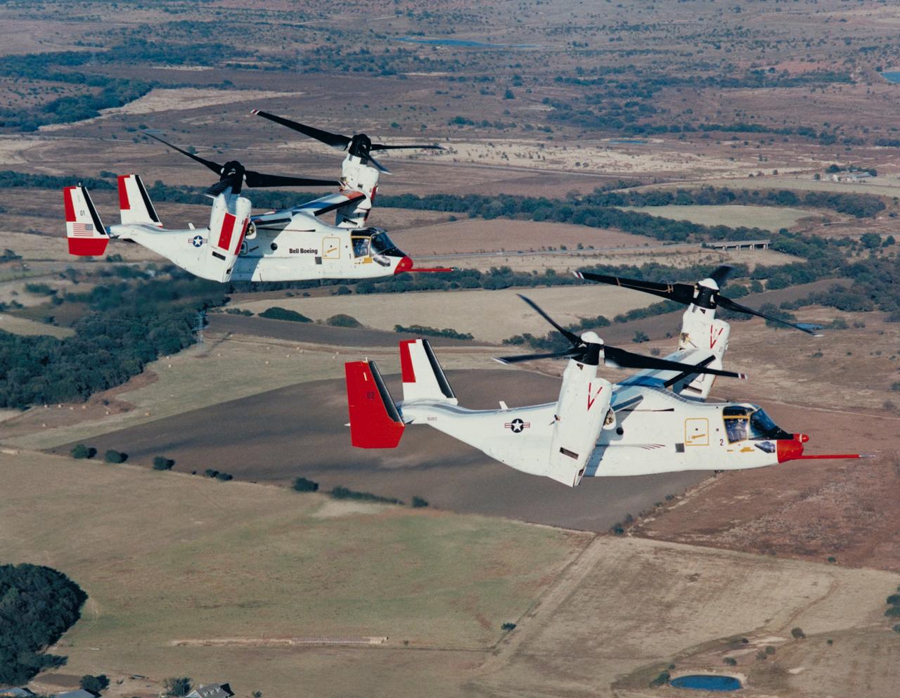 Bell Helicopter Bell-Boeing Tilt Rotor V-22 Ospreys in flight.