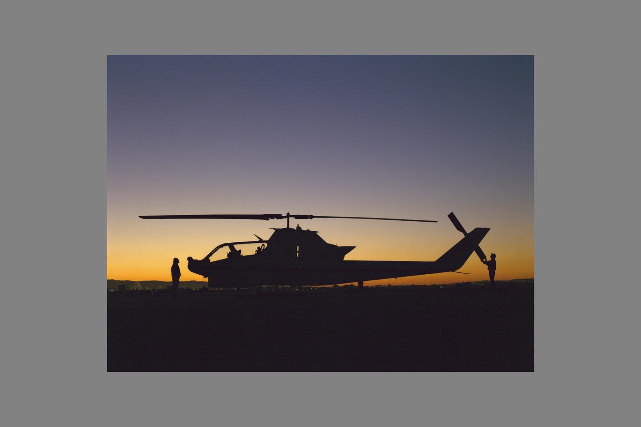 NAH-1S (NASA-736) Cobra on,the NASA Ames flight line at sunrise