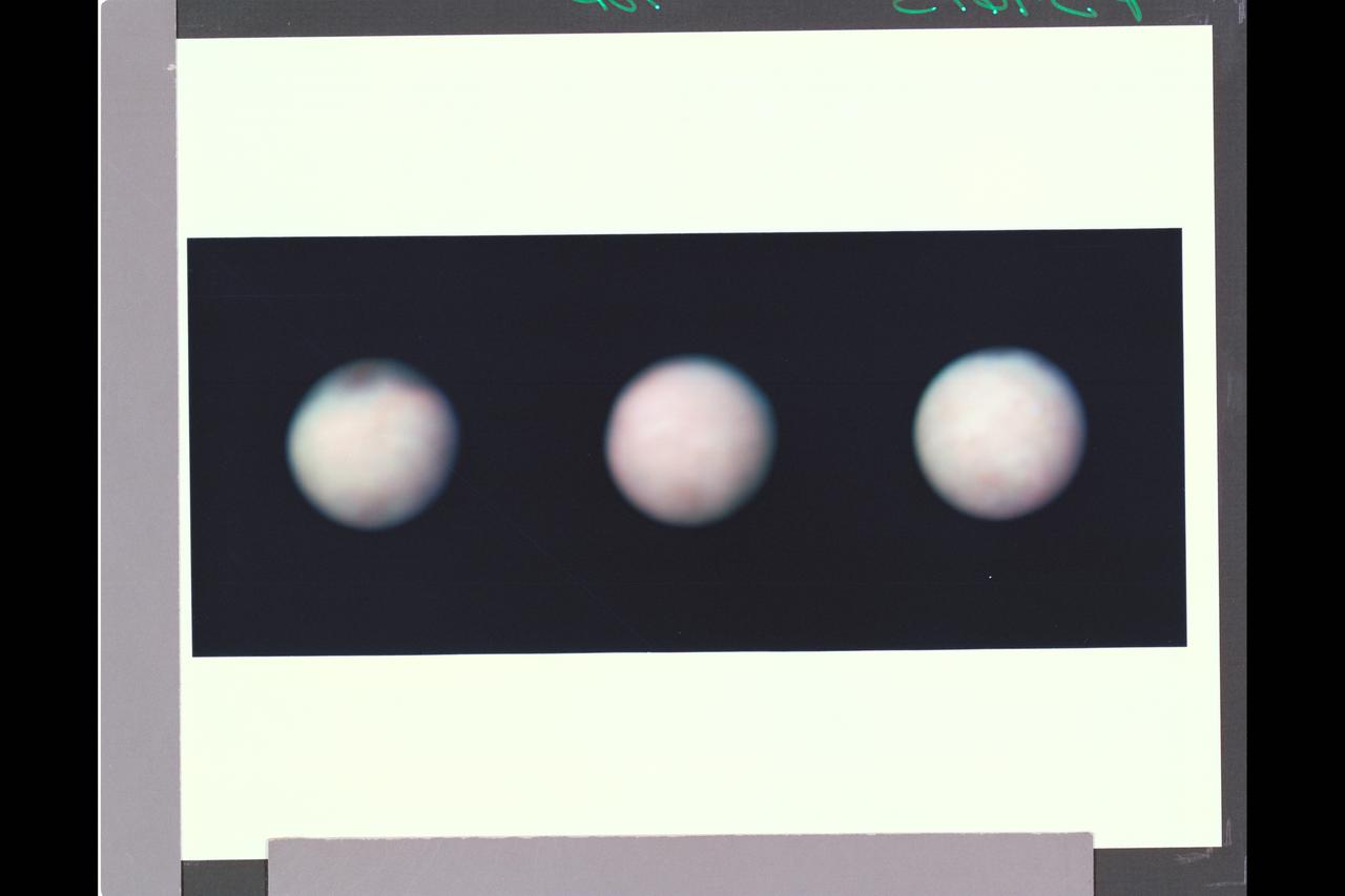 P-34615 These three color images of Triton were taken at three different orbital longitudes to show different faces of the neptune moon. the overall pinkish cast of the images may be due to the presence of reddish material on Triton produced by irradiation of methane gas and ice on Triton. In these pictures the south pole is at roughly 6 o'clock, about 1/6th of the way from the bottom. Near the top of the left on Triton's equator are several large dark spots that are probably suface markings. These markings rotate with a 5.88-day orbital period of Triton. The left image has a central longitude 288 degrees, the center at 351 degrees ( nearly the hemisphere that will be seen at Voyager's closest approach to Triton), and the right image is at 35 degrees logitude.