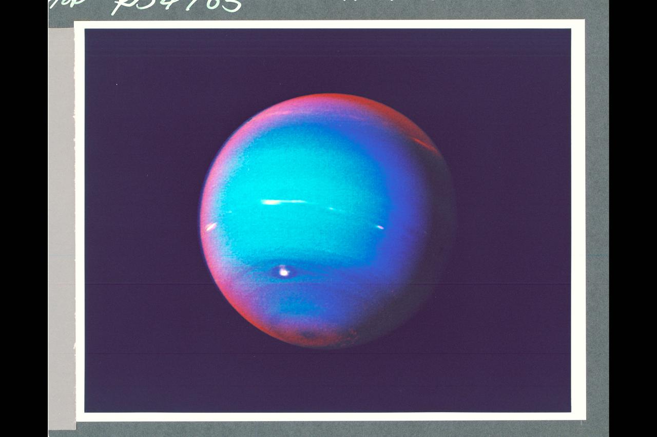 P-34705 This false-color photograph of Neptune was made from Voyager 2 images taken through three filters: blue, green, and a filter that passes light at a wavelength that is absorbed by methane gas. Thus, regions that appear white or bright red are those that reflect sunlight before it passes through a large quantity of methane. The image reveals the presence of a ubiquitous haze that covers Neptune in a semitransparent layer. Near the center of the disk, sunlight passes through the haze and deeper into the atmosphere, where some wavelenghths are absorbed by methane gas, causing the center to appear less red. Near the edge of the planet, the haze scatters sunlight at a higher altitude, above most of the methane, causing the bright red edge around the planet. By measuring haze brightness at several wavelengths, scientists are able to estimate the thickness of the haze and its ability to scatter sunlight. The image is among the last of the full-disk photos that Voyager 2 took before beginning its endless journey into interstellar space.