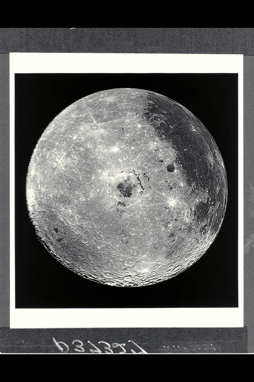 Range : 350,000 miles This image of the western hemisphere of the Moon was taken through a green filter by Galileo at 9:35 am PST. In the center is the Orientale Basin, 600 miles in diameter, formed about 3.8 billion years ago by the impact of an streroid-size body. Orientale's dark center is a small mare. To the right is the lunar near side with the great, dark Oceanus Procellarum above and the small, circular, dark Mare Humorum Below. Maria are broad plains formed mostly over 3 billion years ago as vast bassaltic lava flows. To the left is the lunar far side with fewer maria, but, at lower left, the South-Pole-Aitken basin, about 1200 miles in diameter, which resemble Orientale but is much older and more weathered and battered by cratering. The intervening cratered highlands of both sides, as well as the maria, are dotted with bright, young craters. This image was 'reprojected' so as to center visibility of small features.