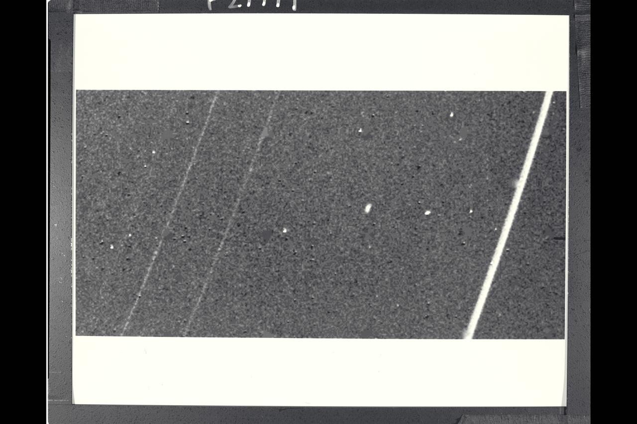 This image of the crescent moon was obtained by the Galileo Solid-State Imaging System, taken at 5 am PST as the spacecraft neared Earth.  The image was taken through a green filter and shows the western part of the lunar near side.  The smallest features visible are 8 km (5 mi) in size.  Major features visible include the dark plains of Mare Imbrium in the upper part of the image, the bright crater Copernicus (100 km, 60 miles in diameter) in the centeral part, and the heavily cratered lunar highlands in the bottom of the image.  The landing sides of the Apollo 12,14 and 15 missions lie within the central part of the image.  Samples returned from these sites will be used to calibrate this and accompanying images taken in different colors, which will extend the knowledge of the spectral and compositional properties of the near side of the moon, seen from Earth, to the lunar far side.