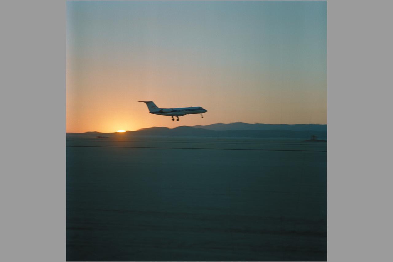 Dryden Fllight Reseach Facility, Edwards, California   STA (Shuttle Training Aircraft, Gulf Stream II) flys chase as STS-41returns from it's mission to Deploy Ulysses Spacecraft... Discovery's main gear is about to touch down at Edwards Air Foce Base to end a four-day mission in space for it's five-man crew. The vehicle landed at 6:57 a.m.  Onboard the spacecraft were Astronauts Richard N. Richards, Robert D Cabana, William M Sheperd, Bruce E. Melnick and Thomas D. Akers.