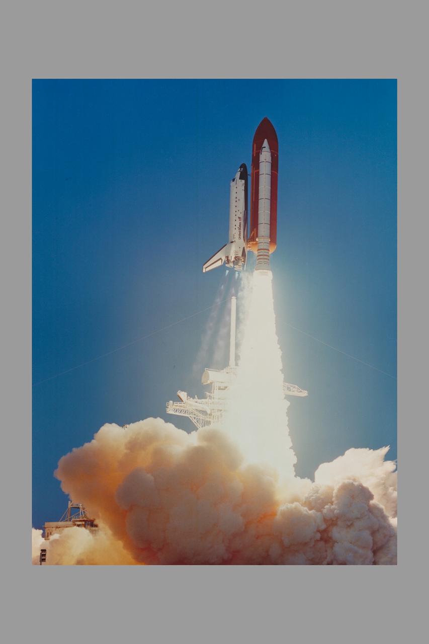 STS-41 Discovery lifts off from Launch Complex 39 at the Kennedy Space Center to begin a four-day mission in space for its five-man crew.  Onboard the spacecraft were Astronauts Richard N. Richards, Robert D Cabana, William M Sheperd, Bruce E. Melnick and Thomas D. Akers. Lift off was at 7:47 a.m. EDT on oct 6, 1990. A feww hours after this photo was made, the crewmembers released the Ulysses spacecraft onits way to a long-awaited mission.