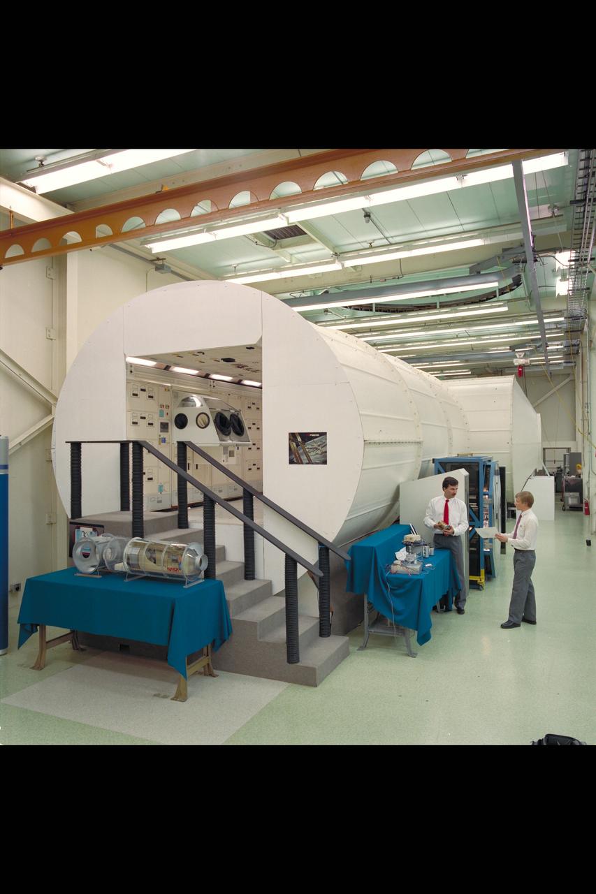 N-244 2.5M Centrifuge Facility mock-up (Mike Horkachuck and David Menche demonstrate)