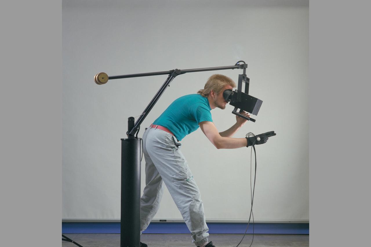 Steve Bryson demonstrates the virtual w.t. (viewer and interactive glove)