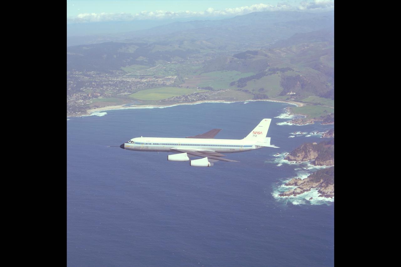 CV-990 (NASA-712) air to air view of flight up California coastline